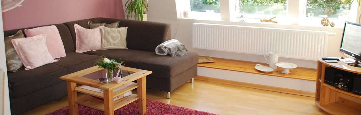 Wohnzimmer in einer Wohnung auf  dem Gesundheitshof Denker
